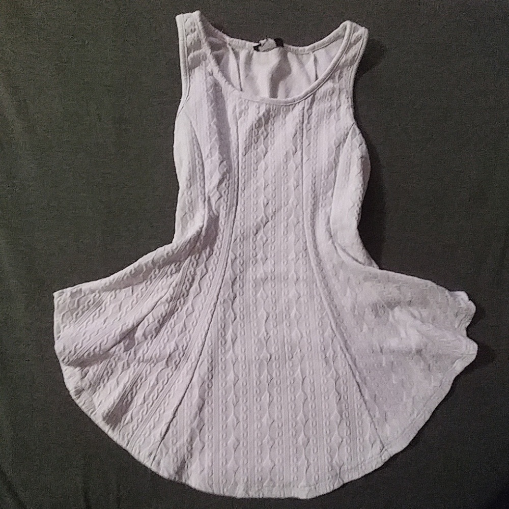2/$10 Neblina White Peplum Sleeveless Top